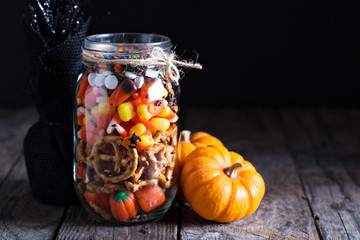 Halloween candy and snacks in a jar