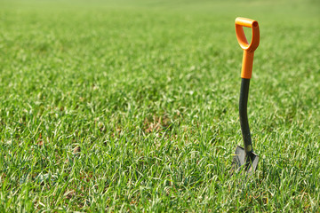 Shovel on grass