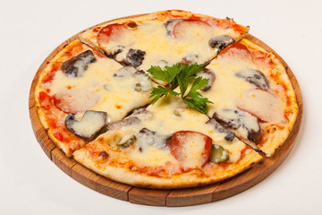 pizza on wooden cutting board