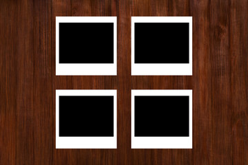 Blank Vintage Photos on Wooden Background