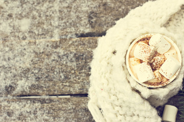 A cup of warm cocoa with marshmallows