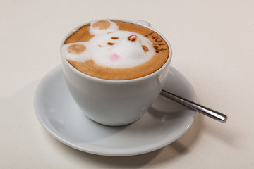Coffee with foam in the form of dog head