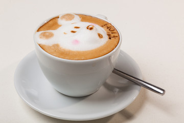 Coffee with foam in the form of dog head