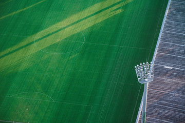 Naklejka premium Boisko do piłki nożnej stadion piłkarski z reflektorami