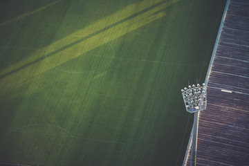 Obraz premium Boisko do piłki nożnej stadion piłkarski z reflektorami