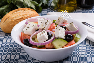greek salad in white bowl
