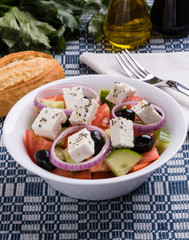 greek salad in white bowl