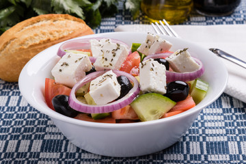 greek salad in white bowl