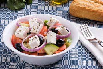 greek salad in white bowl