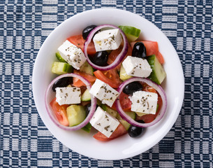 greek salad in white bowl