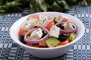 greek salad in white bowl