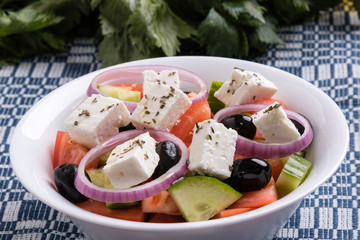 greek salad in white bowl