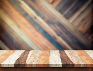 wooden table top at blurred diagonal wood plank wall,Template mo