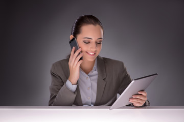 Young businesswoman working with tablet computer