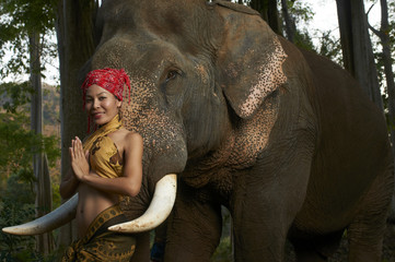Beautiful Model Posing With Live Elephant in Thailand Jungle