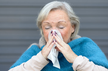 Elderly woman with seasonal influenza