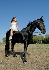 Fototapeta na wymiar young riding girl