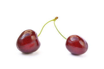 Tasty ripe cherries isolated with white background