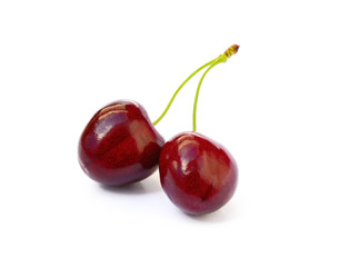 Tasty ripe cherries isolated with white background