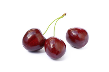 Tasty ripe cherries isolated with white background