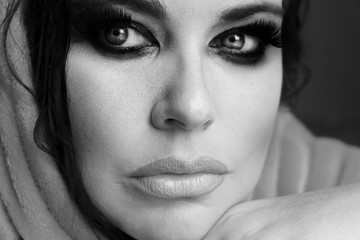 Fototapeta premium close-up of young woman wearing makeup