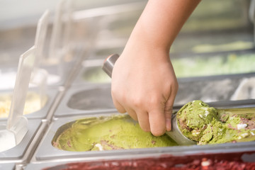 Ice cream Ice cream scooped out of container

