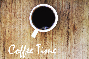 coffee and word writen coffee time in wooden background