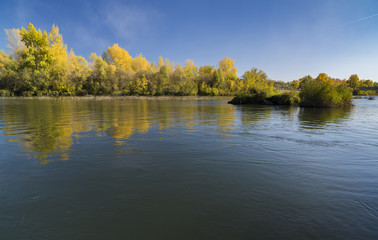 autumn landscape with a river view