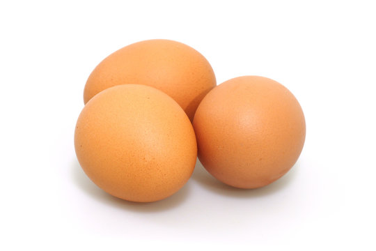 Fresh hen eggs isolated on white background