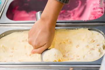  ice cream scooped out of container
