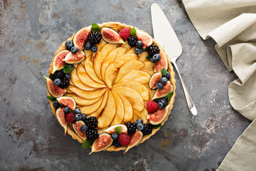 French apple tart decorated with berry