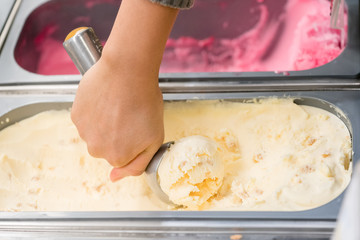  ice cream scooped out of container
