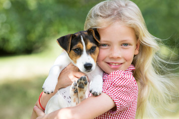 Portrait Of Girl Holding Pet Dog © Daisy Daisy