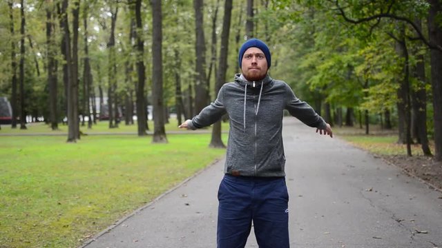 Outdoor. Man training and preparing to run