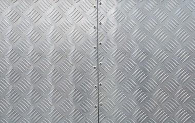metal texture, shiny aluminum background with diagonal relief part