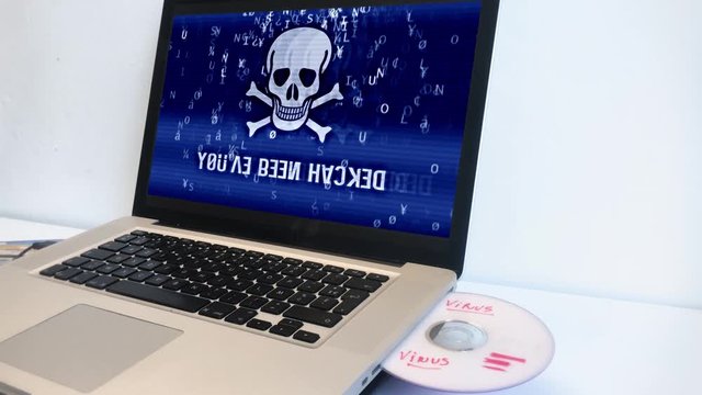 Dolly Shot, Virus Warning In Computer, Hacker Attack. A computer virus is a malware that, when executed, replicates by reproducing itself or infecting other computer.
