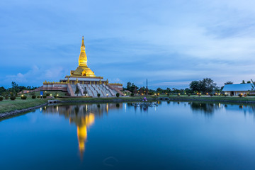 Maha Mongkol Bua Pagoda in Roi-ed Thailand at sunset.