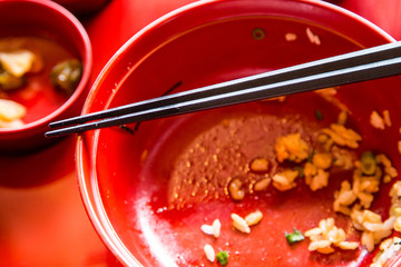 chopstick over finished rice bowl