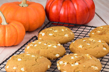 Pumpkin cookies with cream cheese chips.