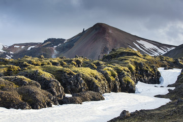 sun light on the lava field and top of mountains in Iceland