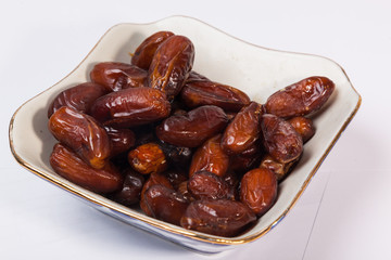 dried dates in white piala