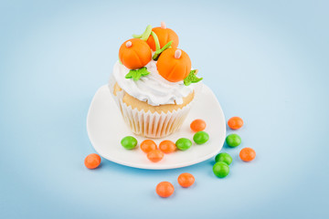 Halloween cupcake with colored decorations