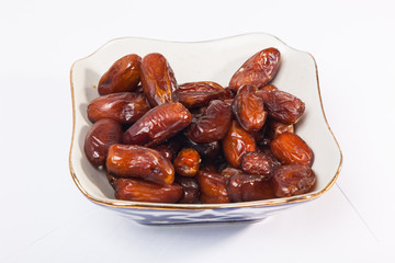dried dates in white piala