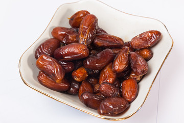 dried dates in white piala