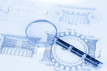 magnifying glass & architectural drawing