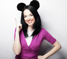 Surprised funny young woman with mouse ears