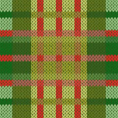 Seamless knitted pattern in green and red hues
