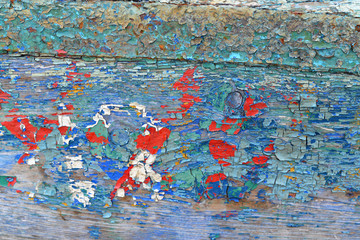 textured surface with blue and orange paint