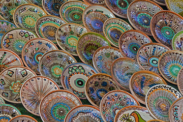 Background with Romanian traditional ceramic in the plates form