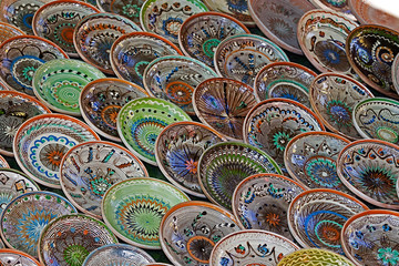 Background with Romanian traditional ceramic in the plates form